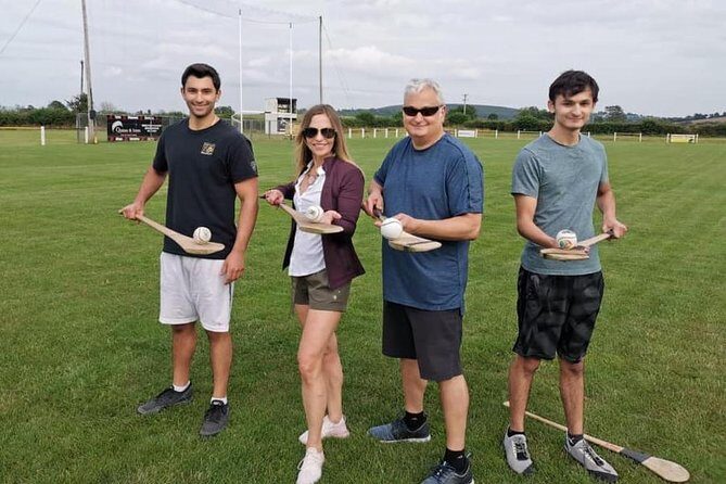 Hurling Tours Ireland - Hurling Experience in Kilkenny - On the field: learning ground strikes, hand passes, and solo runs